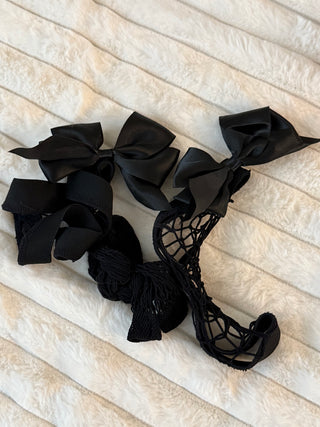 One size fishnet stockings with black bow