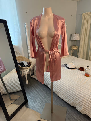 Silky pink short robes with belt. Fits small.